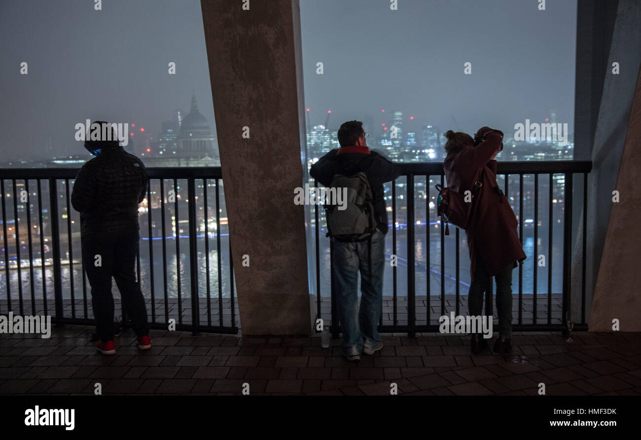 Photographers take photos from the balcony of the Tate Modern Switch House in London Stock Photo