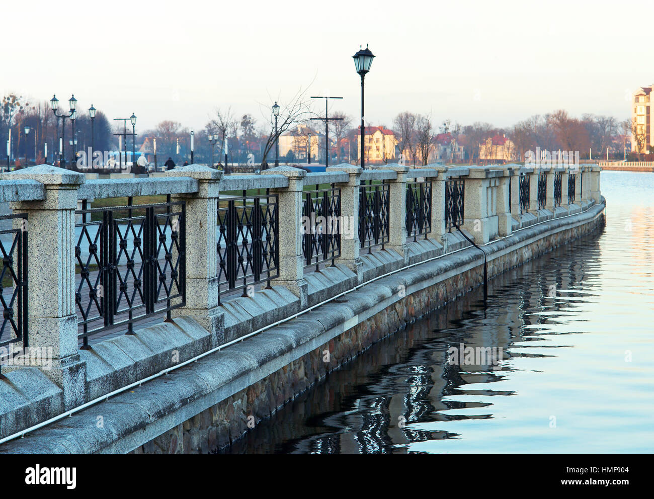 fence of wrought iron on the lake, fence the lake shore Stock Photo - Alamy