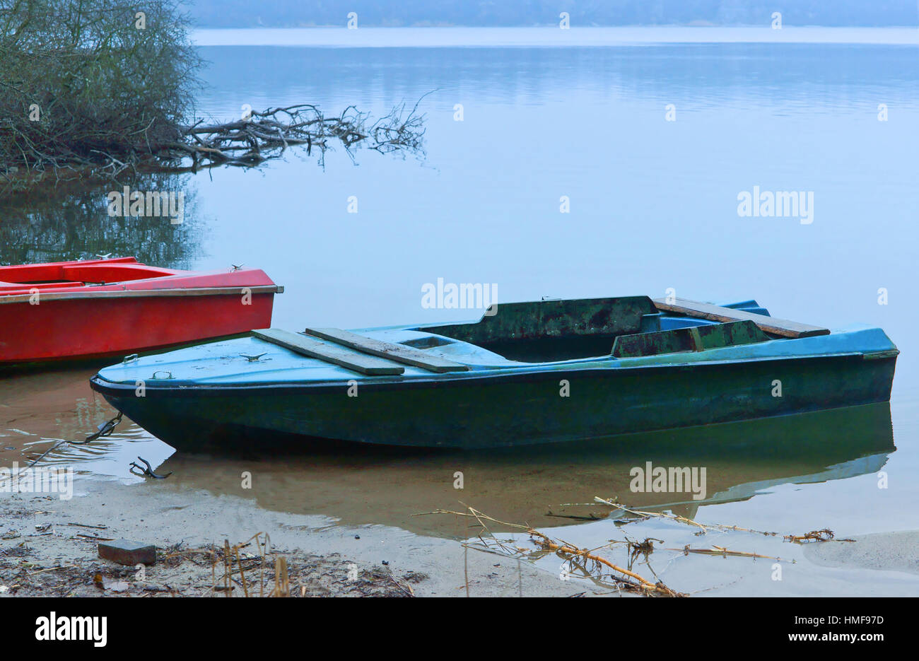 small boat moored to the end of the season fishing Stock Photo