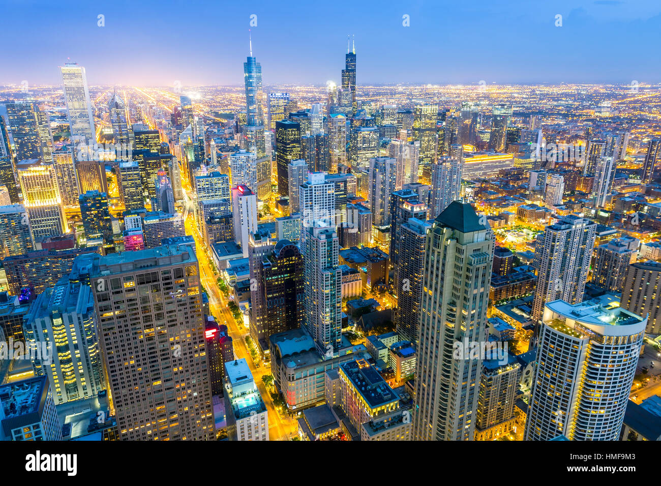 Aerial view of downtown towers at sunset from high above, Chicago ...