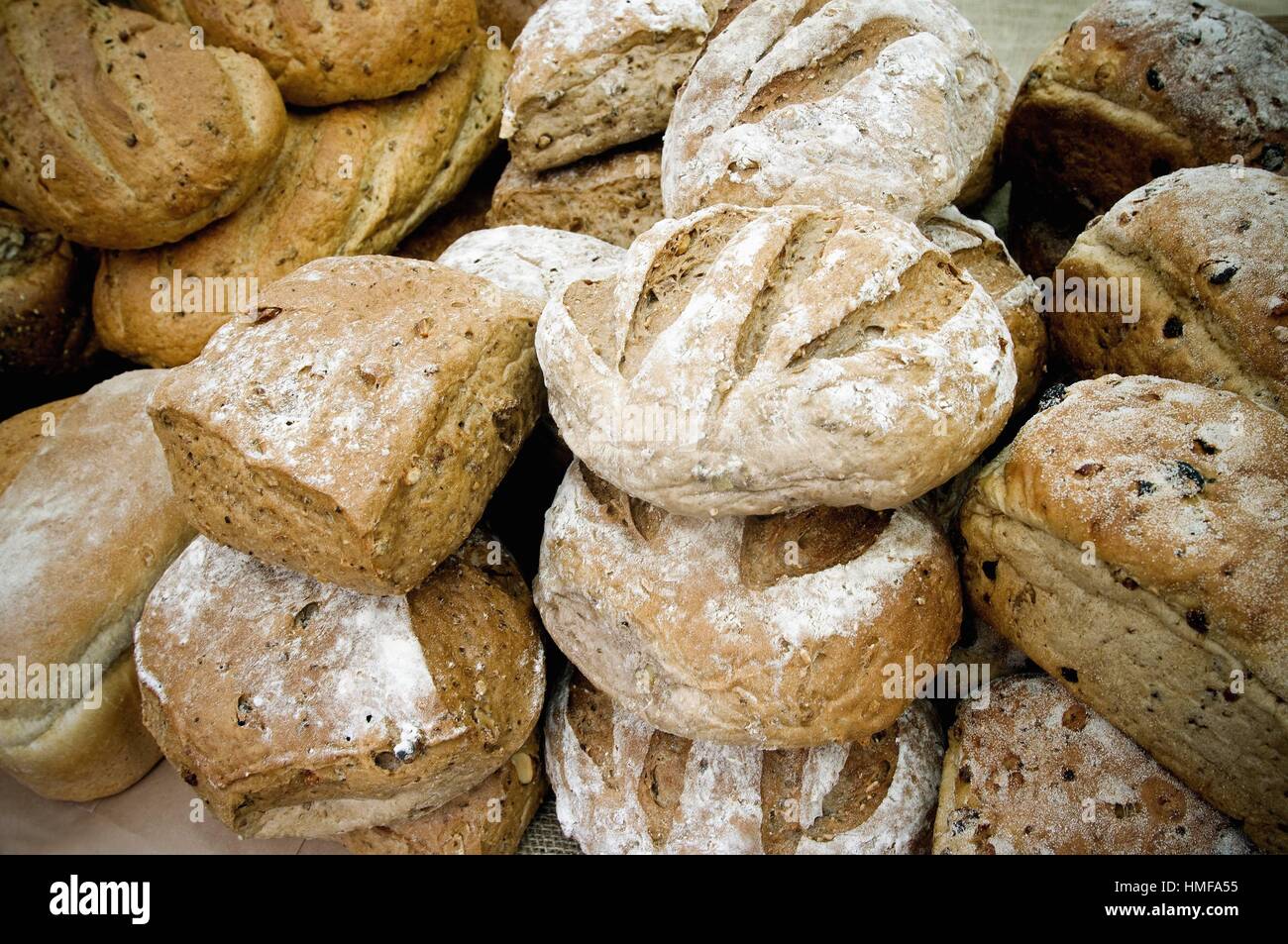 different types of bread in a bakery. Chapatas, Wholemeal bread, Organic, Seeded, Granary bread