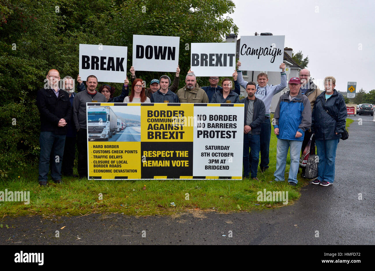 People at an anti-Brexit protest along the Donegal – Londonderry border, Northern Ireland. Stock Photo