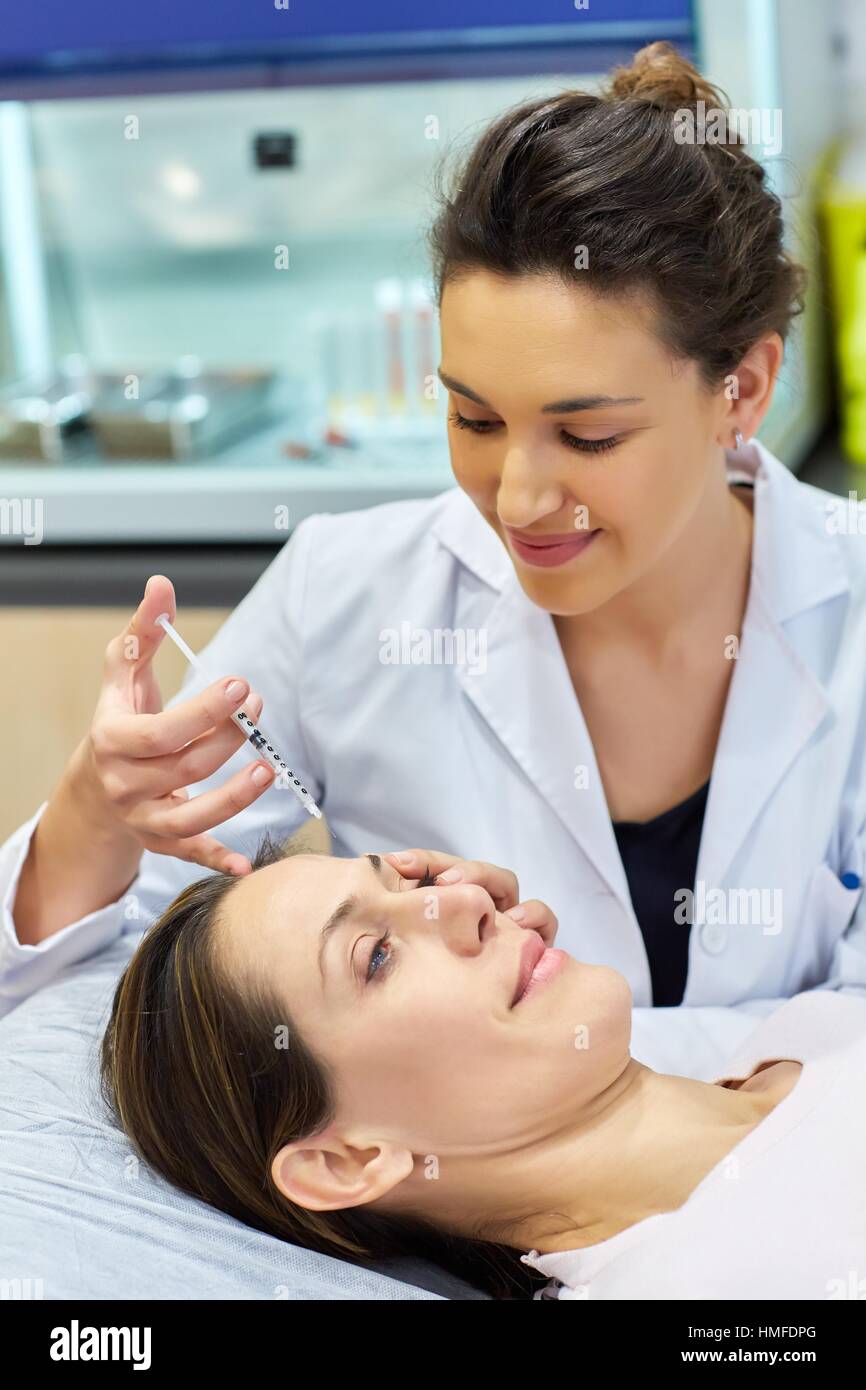 Syringe. Botox, cosmetic medicine. Botulinum toxin treatment involves