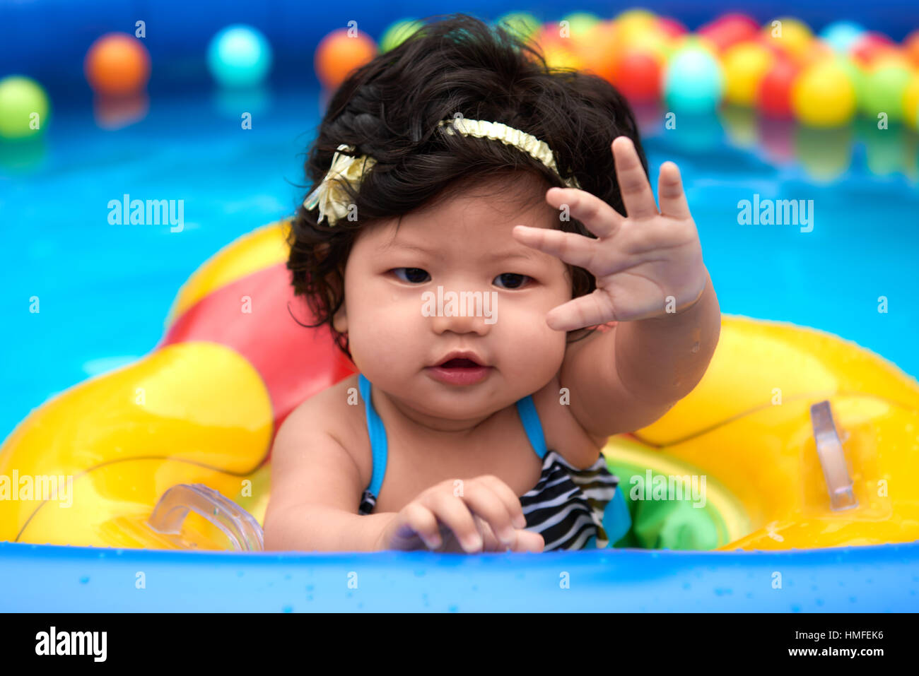 Baby in swimming suit hires stock photography and images Alamy