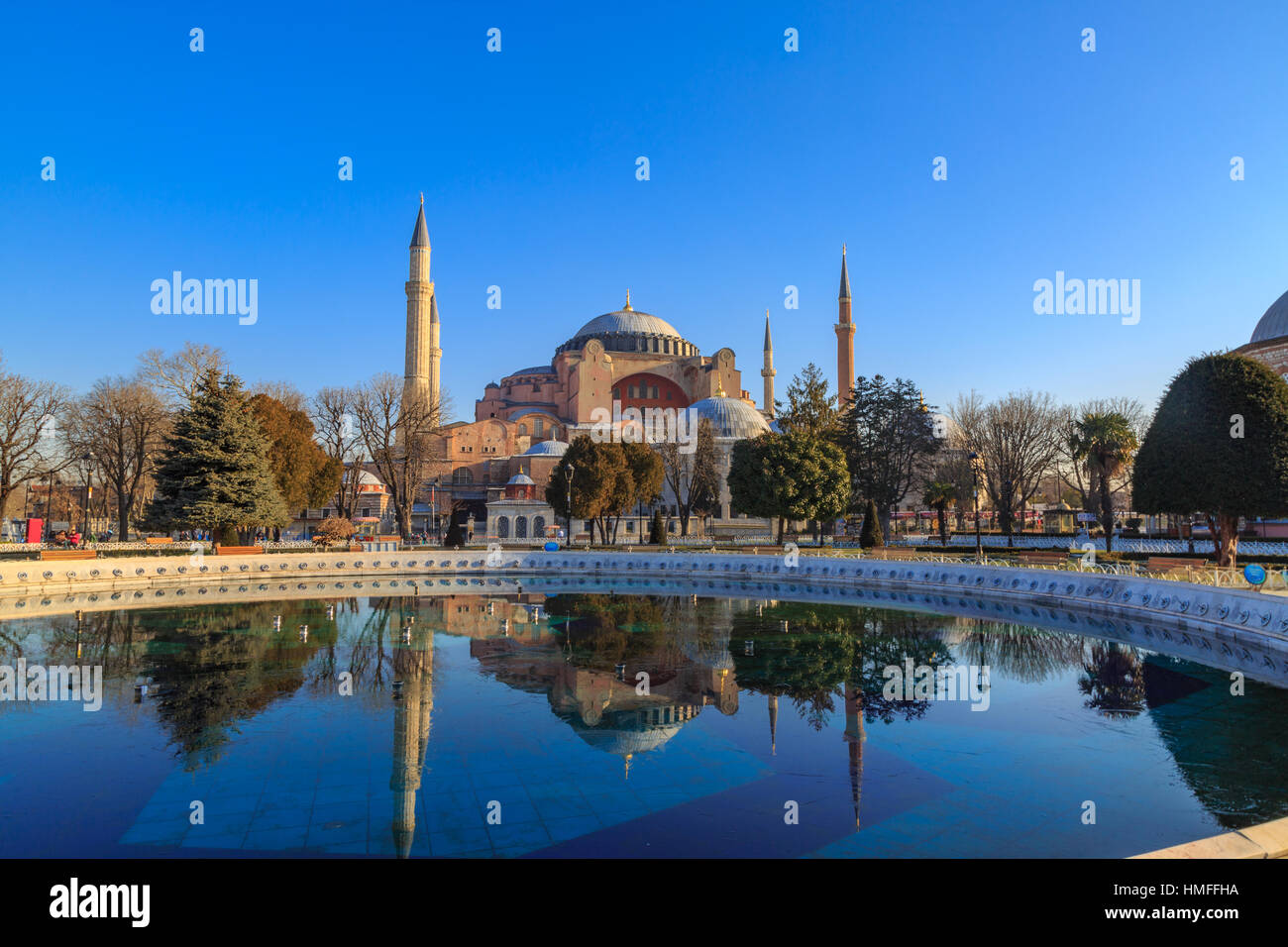 hagia sophia with reflection on water in sultanahmet square in istanbul ...