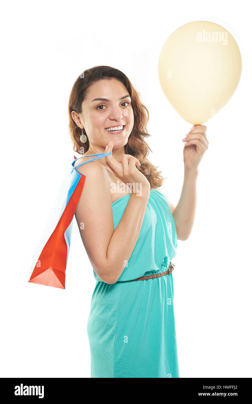 happy girl with shopping bag and yellow balloon Stock Photo Alamy