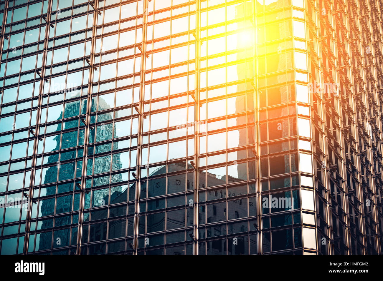 Modern office building with sun ray reflection from corner Stock Photo ...
