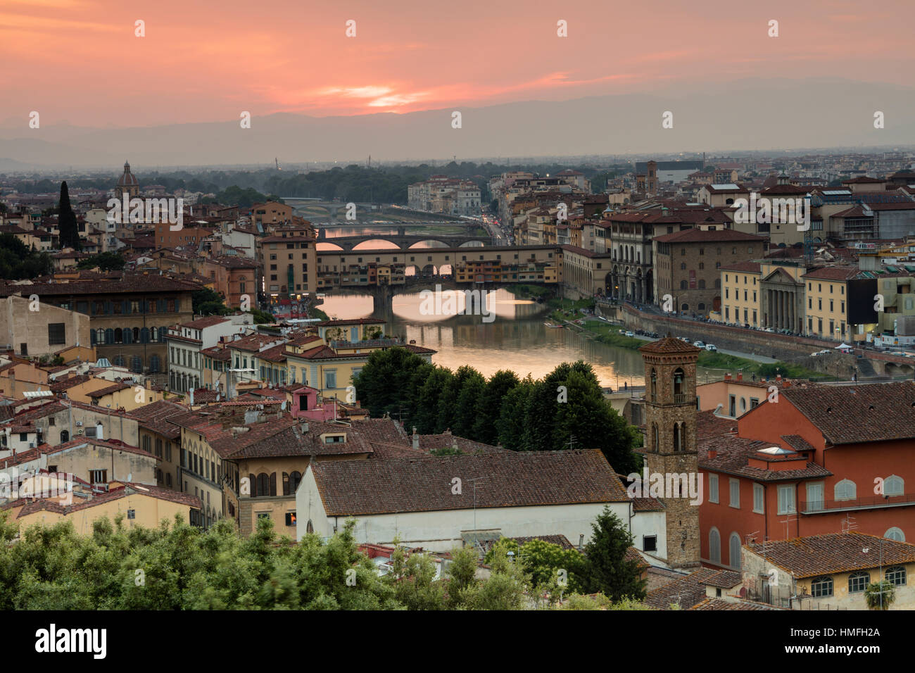 View of the Arno River and Ponte Vecchio at sunset from Piazzale Michelangelo, Florence, Tuscany, Italy Stock Photo