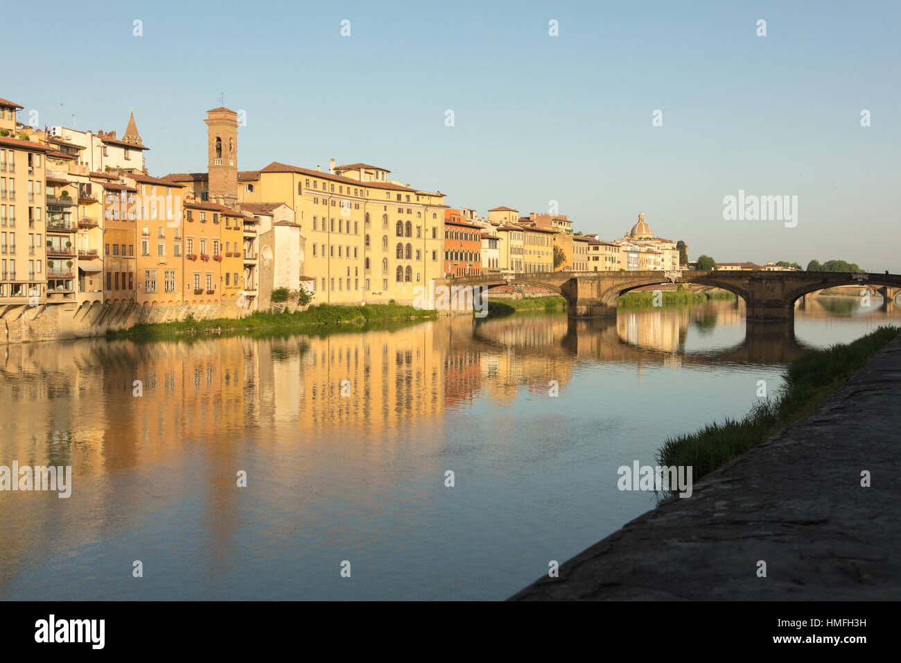 View of Ponte Della Vittoria on the Arno River with Brunelleschi's Dome in the background, Florence, Tuscany, Italy Stock Photo
