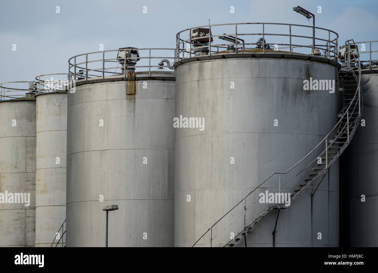Industrial silos. Tall and with external staircase Stock Photo Alamy