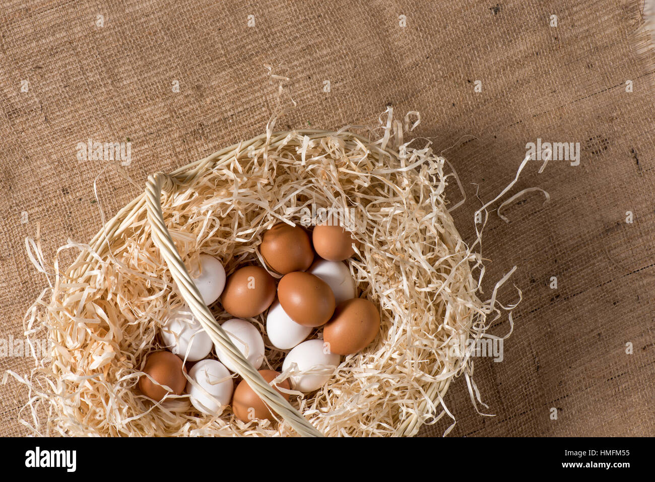 Chicken eggs in basket Stock Photo Alamy