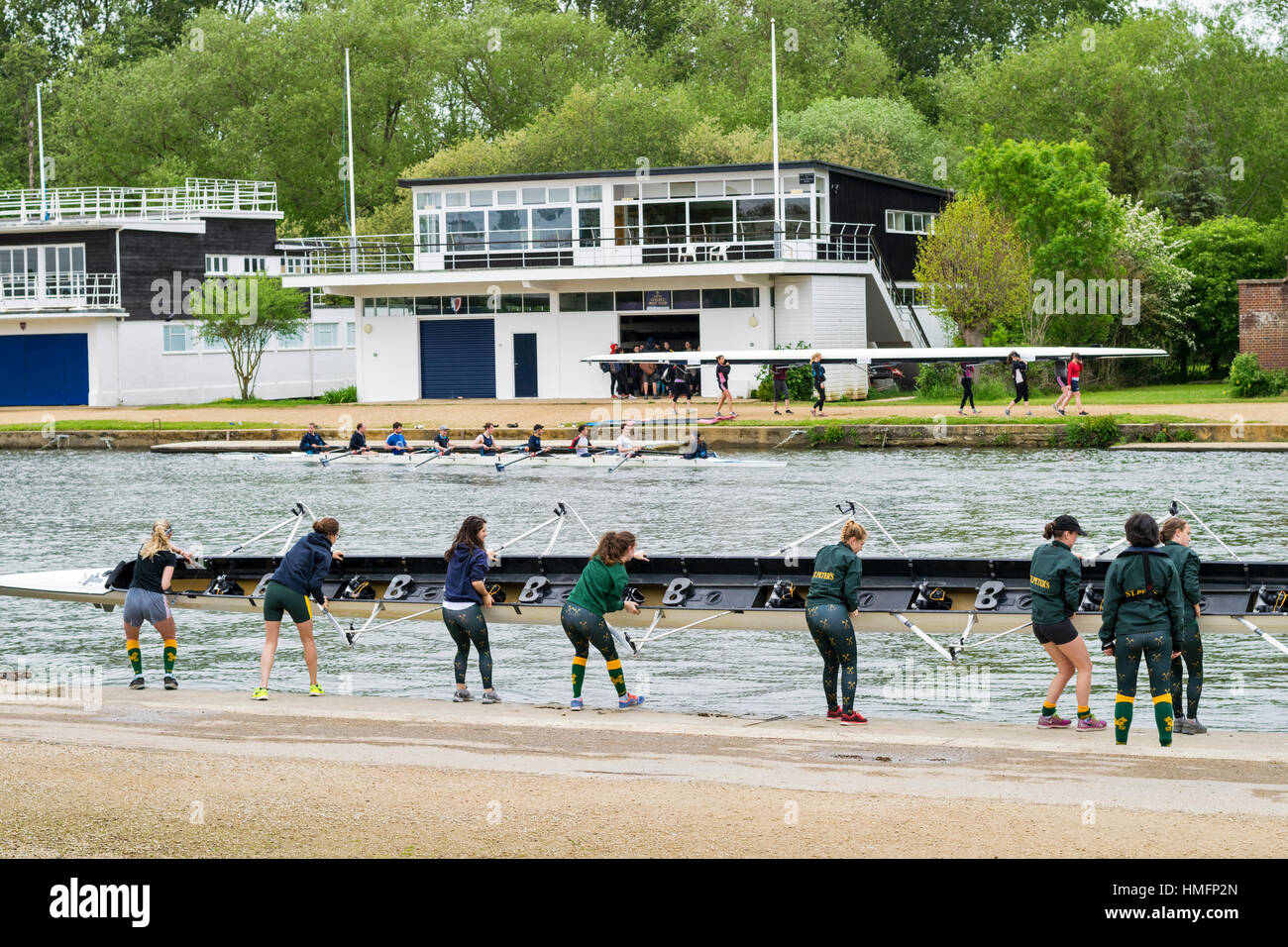 OXFORD UNIVERSITY ROWING TEAMS ON THE RIVER THAMES TEAM FROM ST PETERS