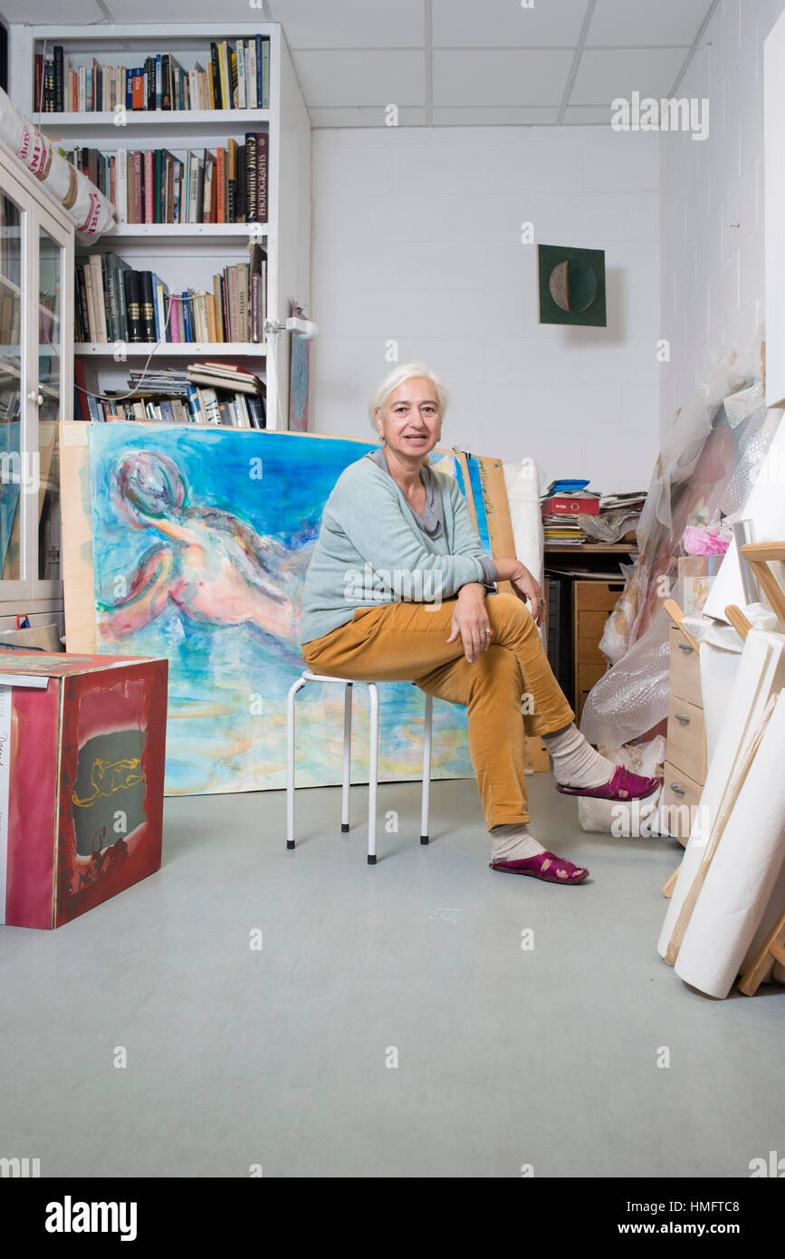 Portrait Of An Artist Sitting In Their Creative Art Studio Shot For A Magazine Editorial With Their Creative Art Works And Pottery And Paintings Stock Photo Alamy