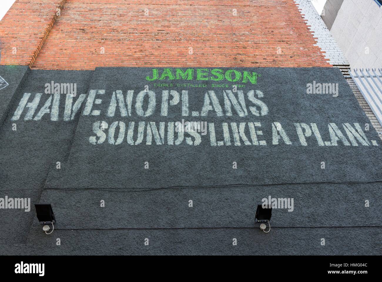 Have No Plans, Sounds Like a Plan with an advertisement for Jameson Whiskey in Skipper Street, Belfast. Stock Photo