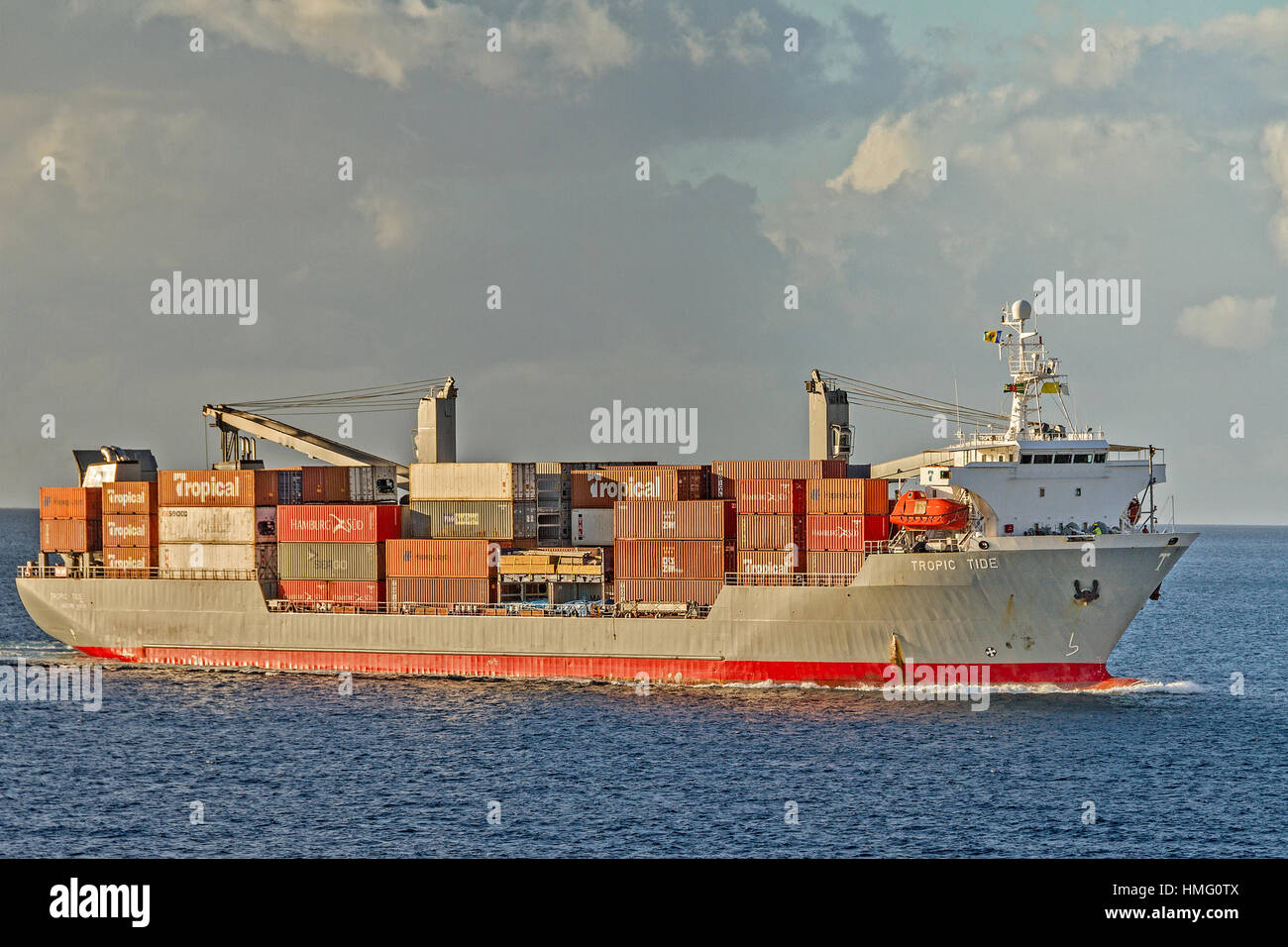 Container Ship Approaching Dominica West Indies Stock Photo