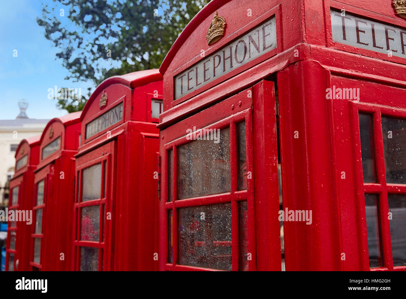 London old red Telephone boxes in a row at England Stock Photo