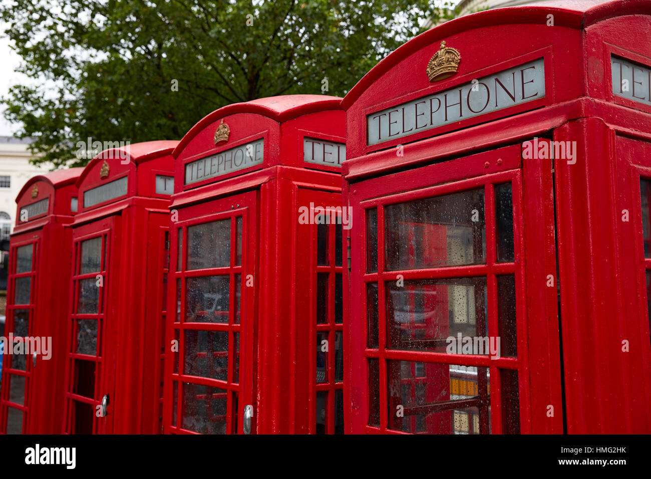London old red Telephone boxes in a row at England Stock Photo