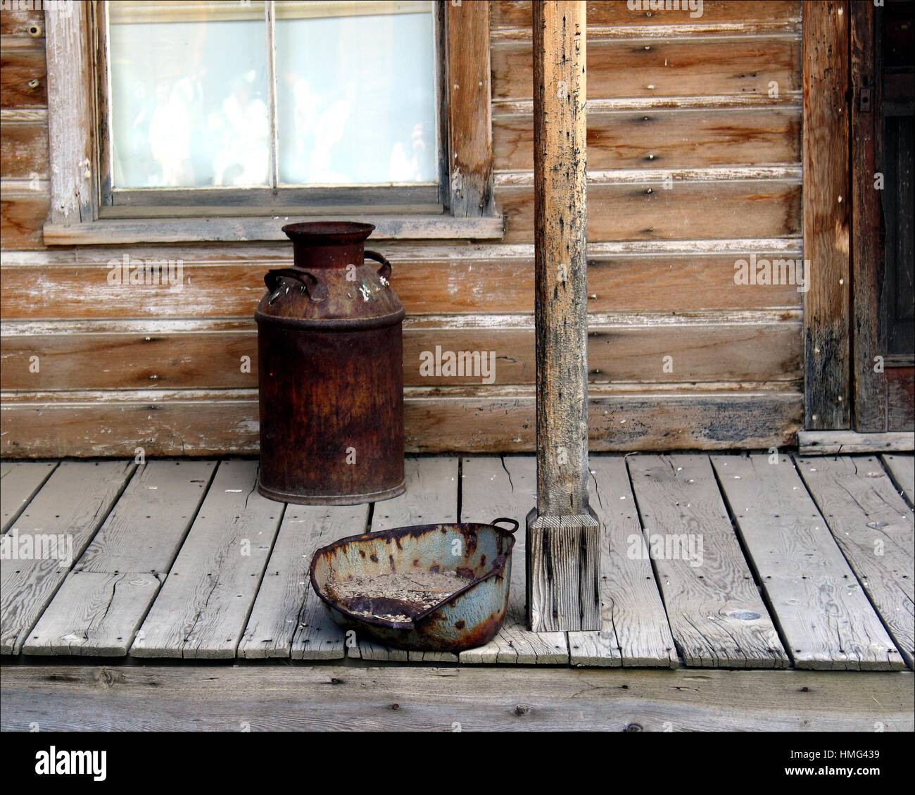 Close up of an old cabin with an old rusty milkcan in Bodie, CA. Stock Photo