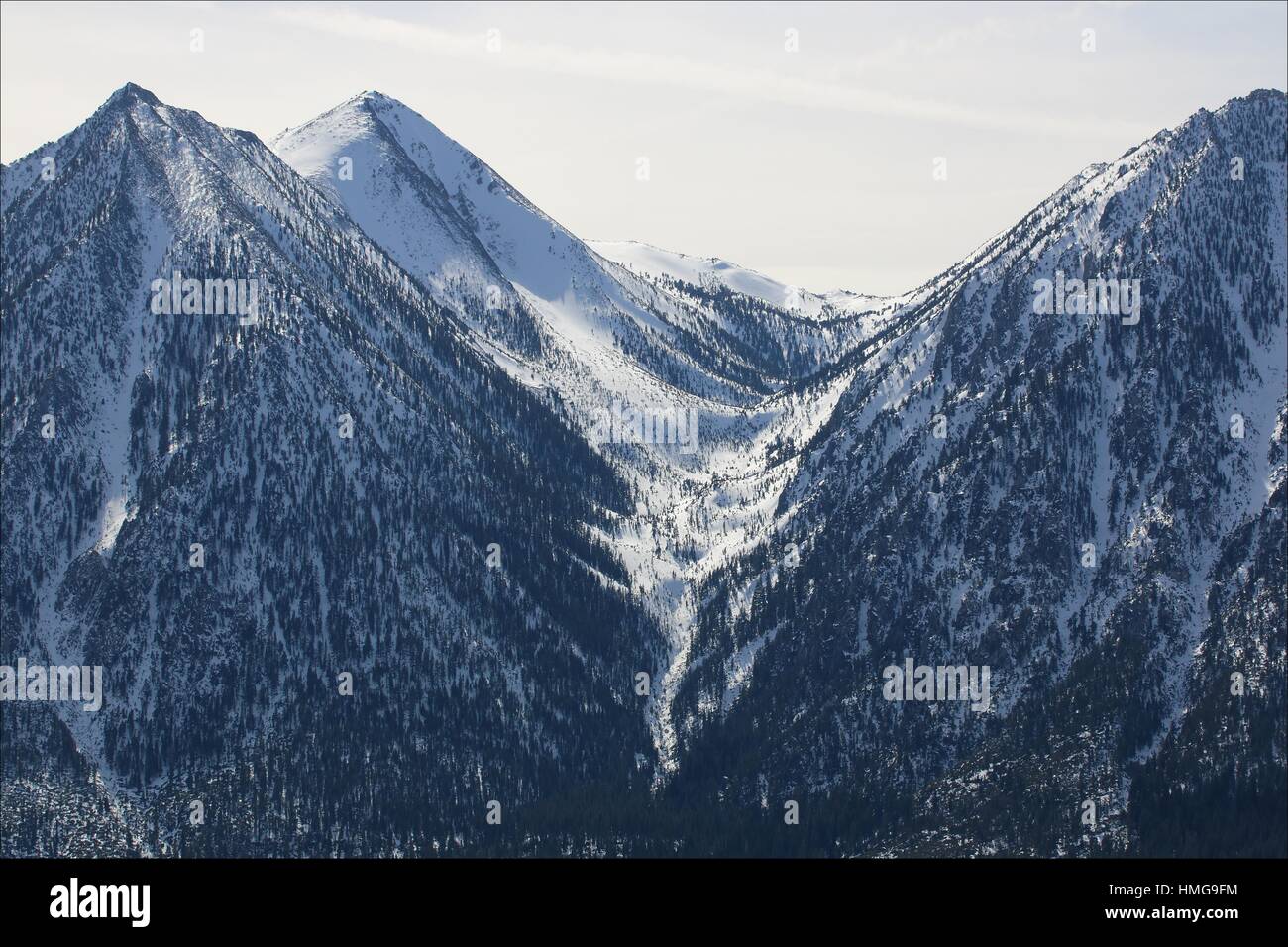 The eastern side of the Sierra Nevada mountains in the Carson Valley, near Genoa, Nevada, wear a winter coat of snow, USA Stock Photo