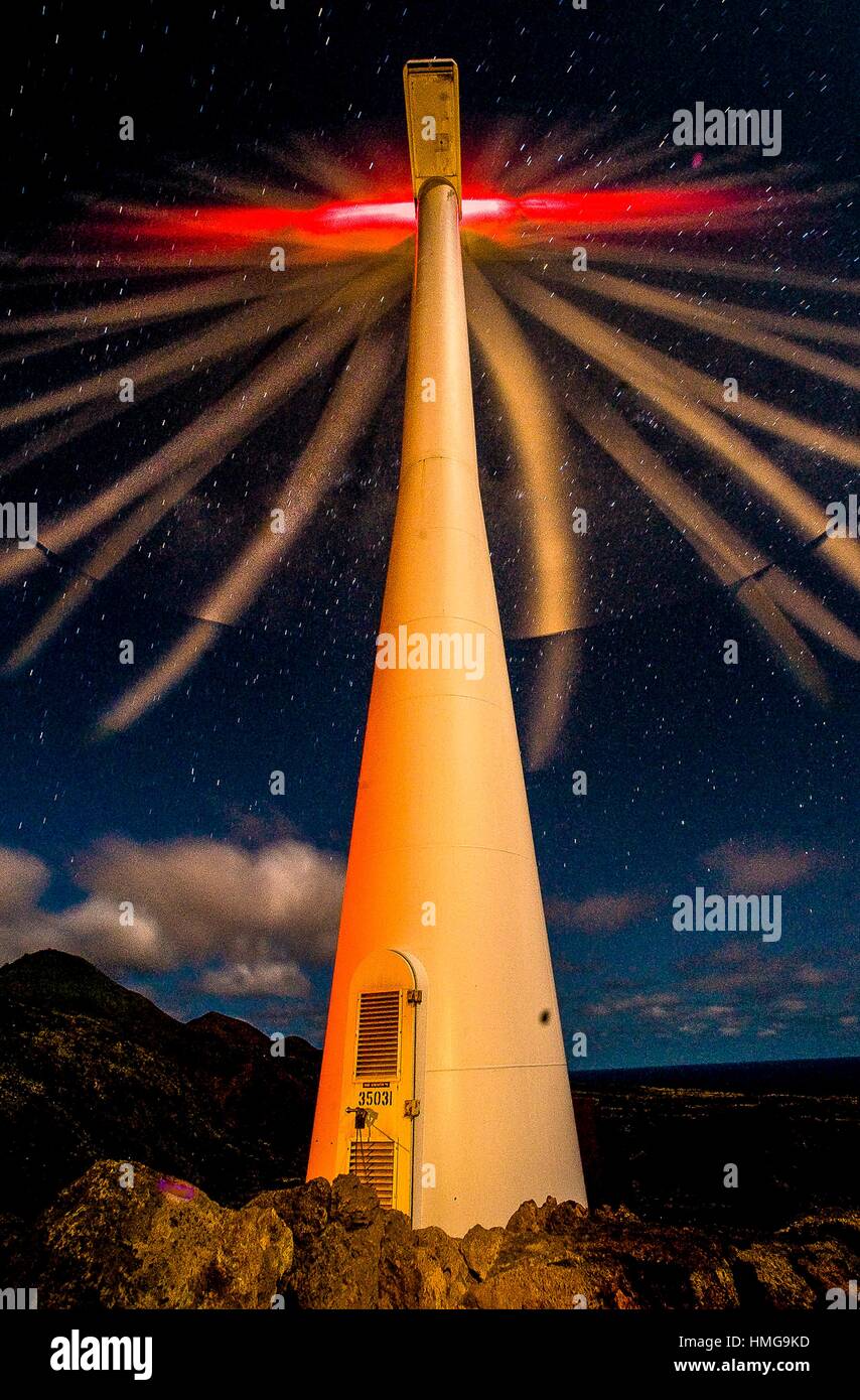 Long exposure and multiple light reveals the 110-foot high tower that holds  a 900kW wind turbine, with three 4. 2 ton blades that rotate 25. 5 meters  Stock Photo - Alamy
