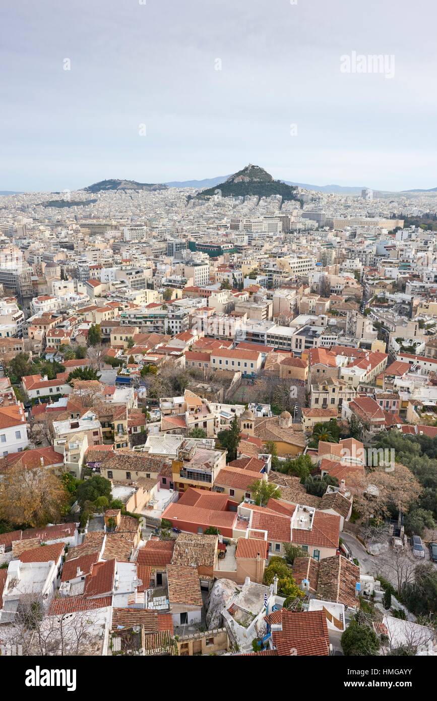 Higly populated districts of Plaka, Dexameni and Exarchia seen from The Acropils. In foreground Lycabetus Hill. Athens. Greece. Stock Photo
