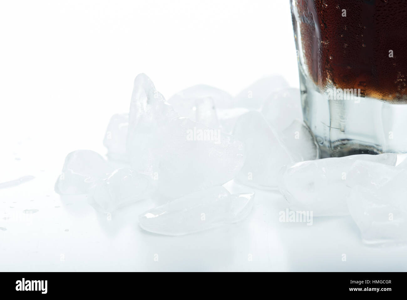close up of ice and coke isolated on white background Stock Photo
