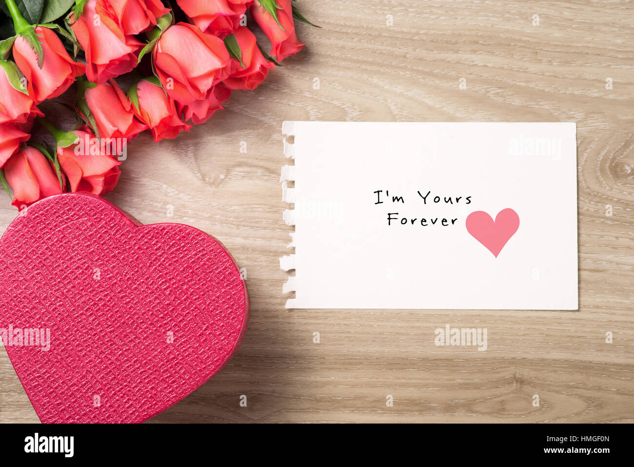 Valentine's Day Background with Bouquet of red roses Stock Photo - Alamy
