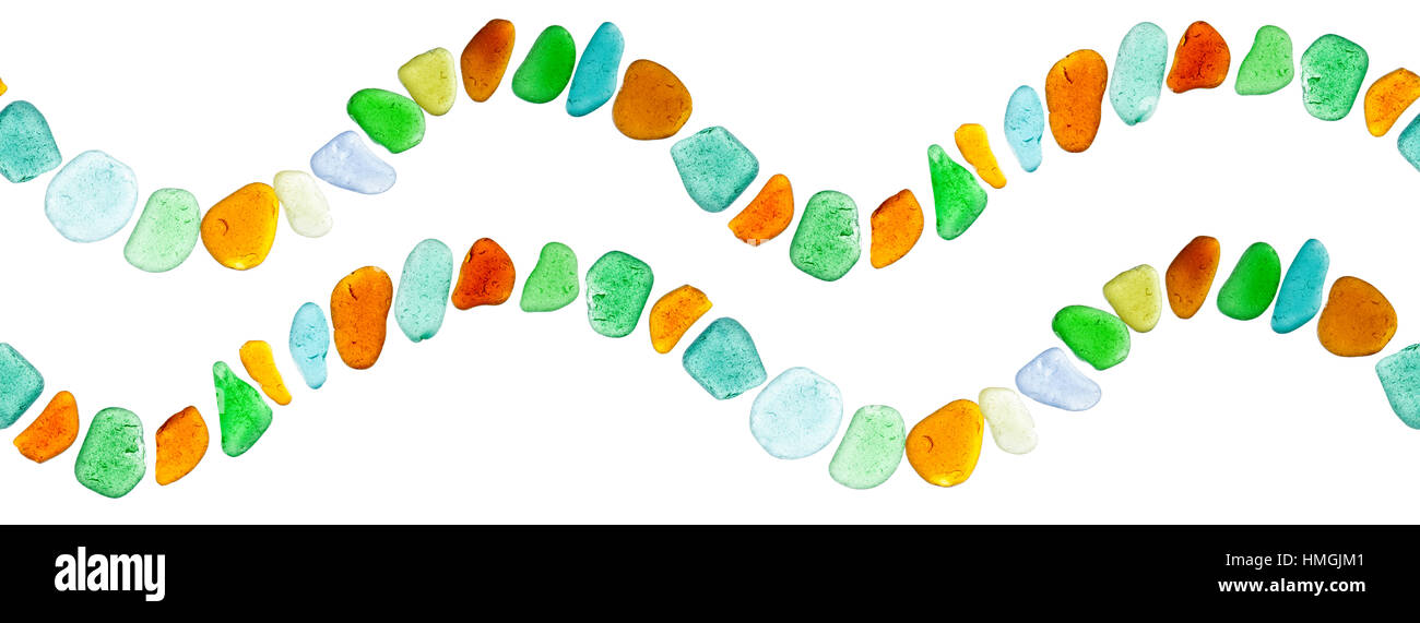 sea glass peices border in shape of waves on white Stock Photo