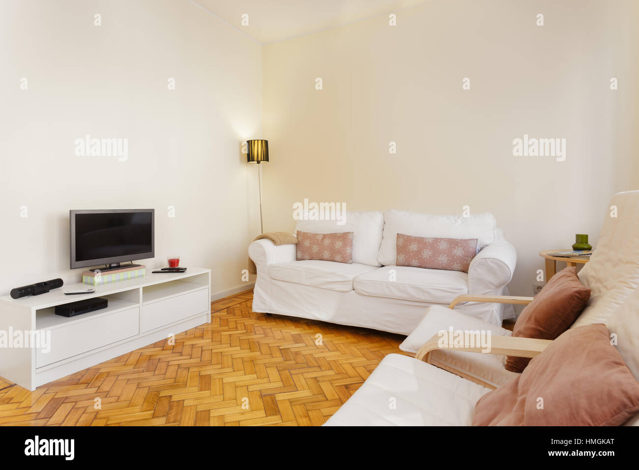 Living Room with Hardwood Floors and Natural Light Stock Photo - Alamy