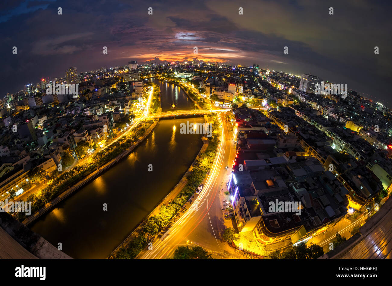 Aerial sunshine view of rooftop skyscraper on Nhieu Loc canal in Ho Chi ...