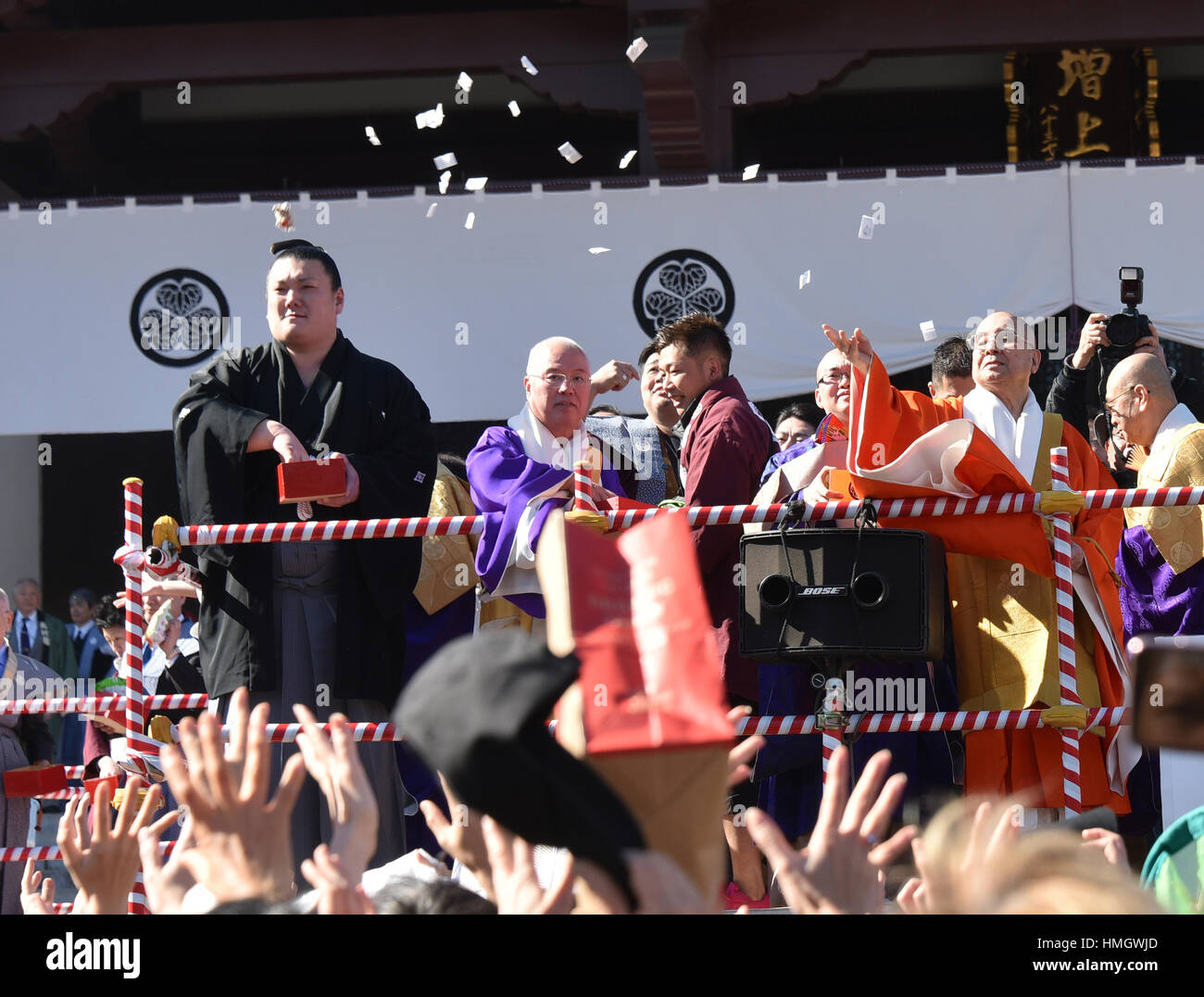 Tokyo, Japan. 3rd Feb, 2017. Sumo wrestlers and celebrities throw out lucky charms to a huge crowd in a traditional ritual celebrating the arrival of spring at Tokyos Zojoji Buddhist temple on Friday, February 3, 2017. Credit: Natsuki Sakai/AFLO/Alamy Live News Stock Photo