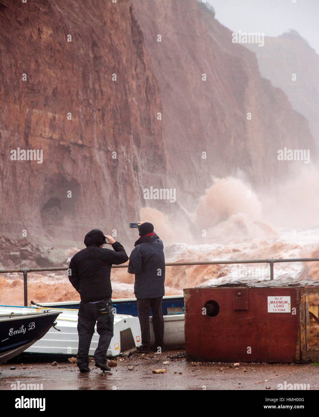 Sidmouth, Devon, UK. 3rd February, 2017. Storms pound into the red sandstone cliffs at Sidmouth, Devon. Rapid coastal erosion is of growing concern in the town, and talks continue on the best way to combat this and protect this area of the Jurassic coast line. Photo by Tony Charnock/Alamy Live News Stock Photo