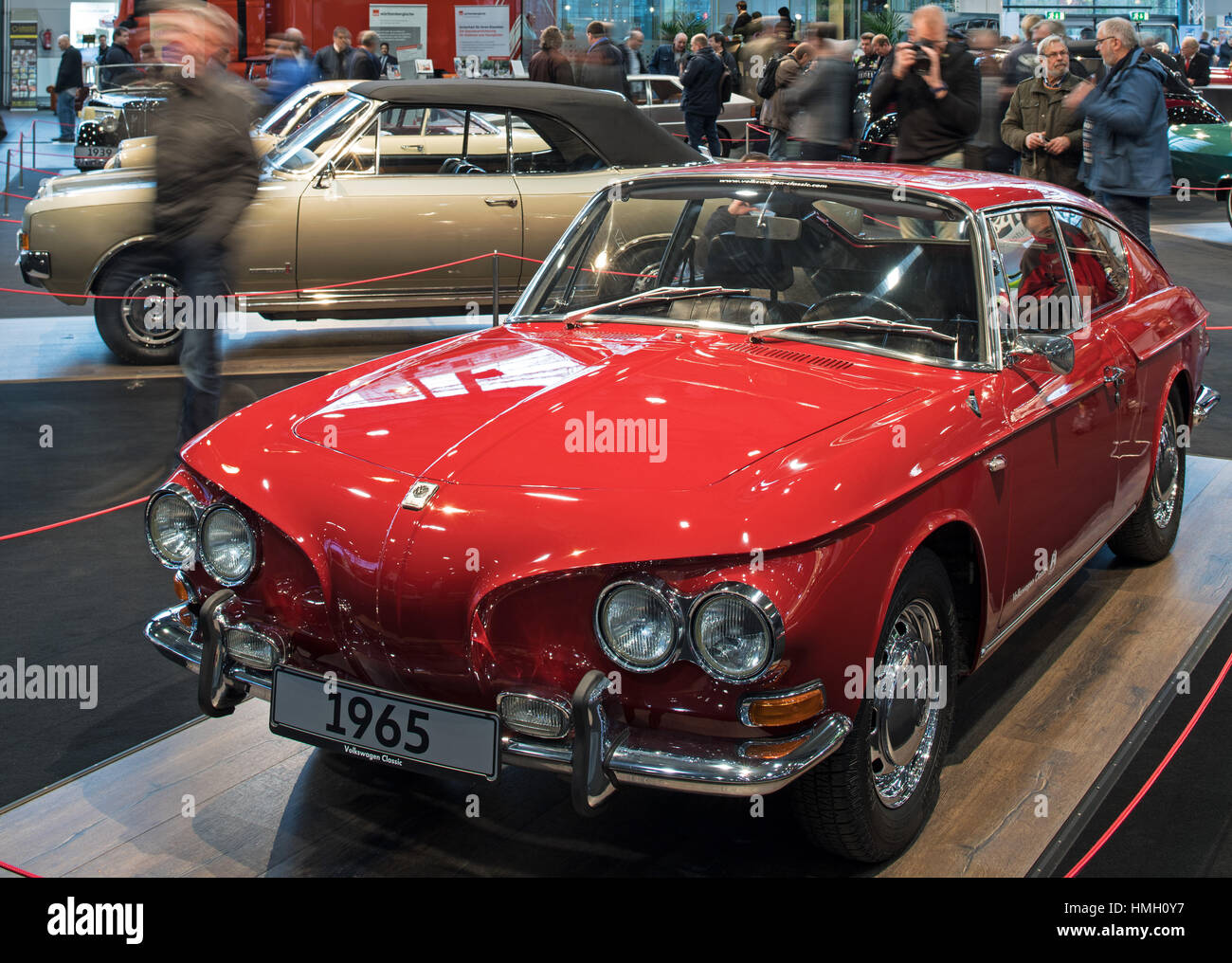 Dremen, Germany. 03rd Feb, 2017. Visitors to the 'Bremen Classic Motorshow' look at a VW Karmann-Ghia 1600 TC, a coupe study from 1965, in Dremen, Germany, 03 February 2017. The car is from the Karmann Museum at the VW plant in Osnabrueck, Germany, and is part of this year's special exhibition 'The Treasury of Karmann' with thirteen rarities and styles studies that never became a series. The 'Bremen Classic Motorshow' continues until 05 February 2017. Photo: Ingo Wagner/dpa/Alamy Live News Stock Photo
