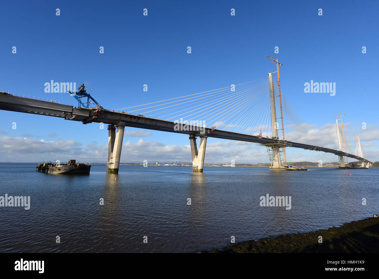 Edinburgh, Scotland, UK. 3rd Feb, 2017. The new Queensferry Crossing road bridge across the Forth Estuary as the last deck section is inched into its final position to complete the span. Credit: Ken Jack/Alamy Live News Stock Photo