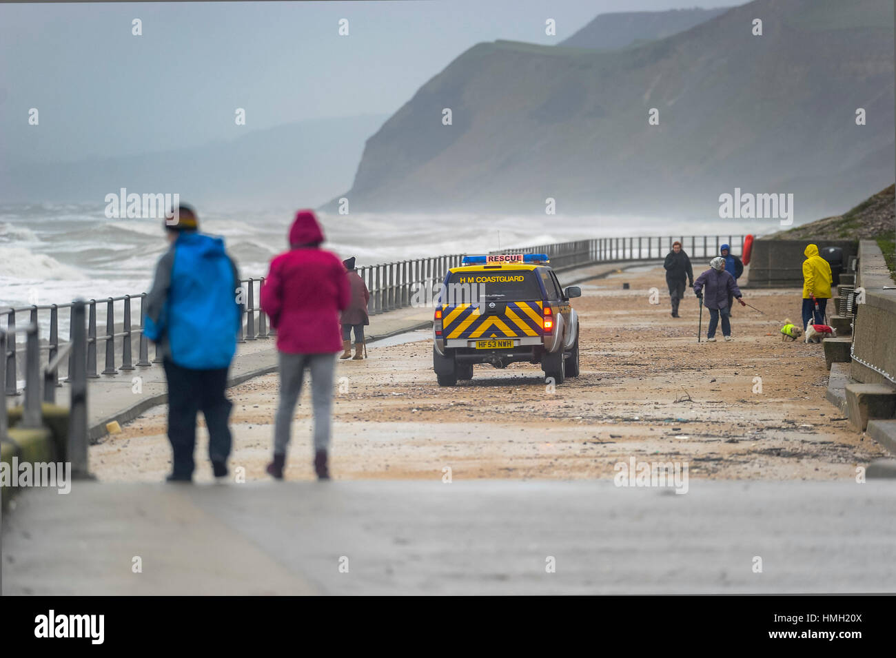 West Bay, Dorset, UK. 3rd Feb, 2017. UK Weather. A Coastguard vehicle driving along the promanade during the stormy conditions at West Bay in Dorset. Credit: Graham Hunt/Alamy Live News Stock Photo