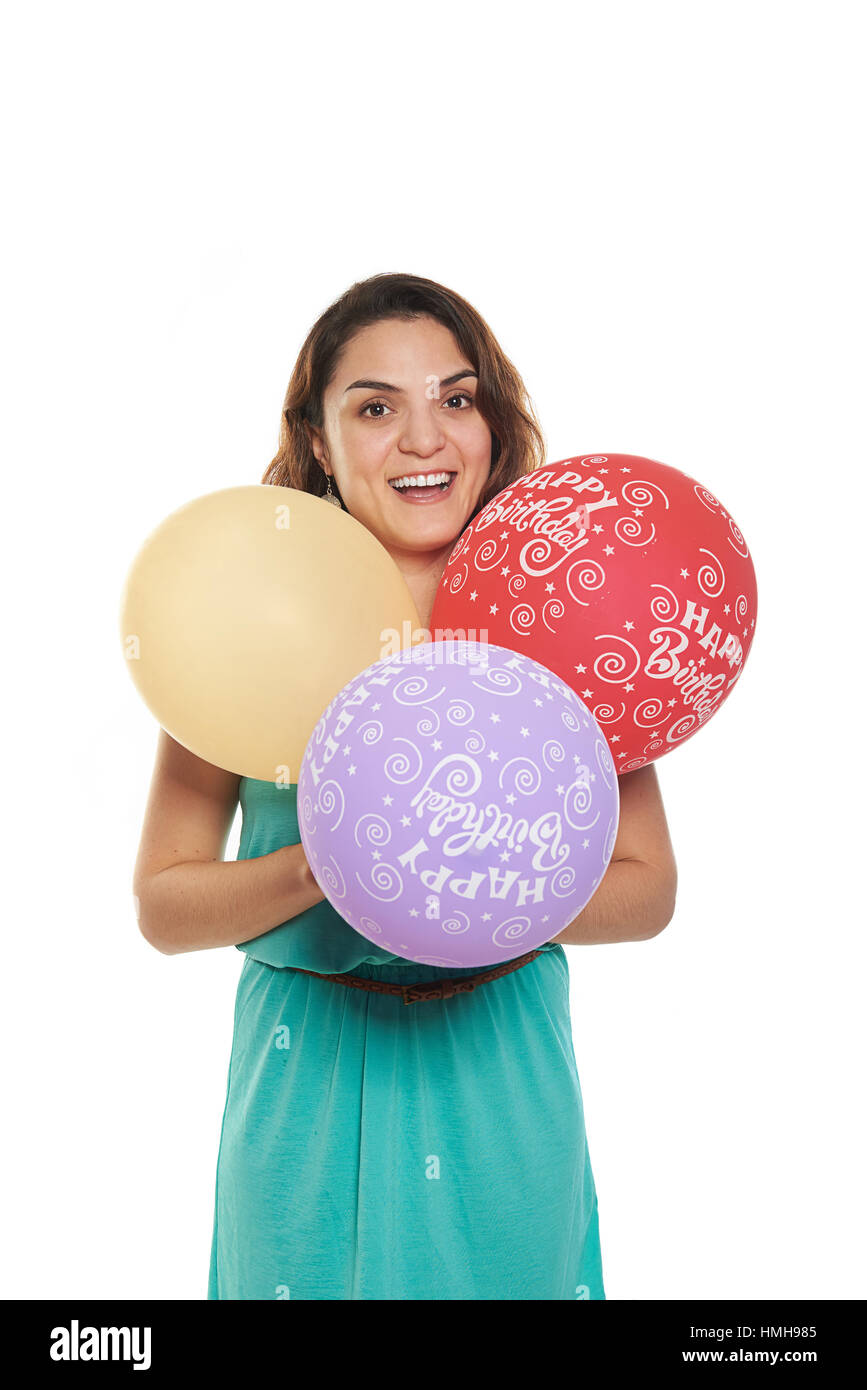 Girl with happy birthday balloons in three colors Stock Photo