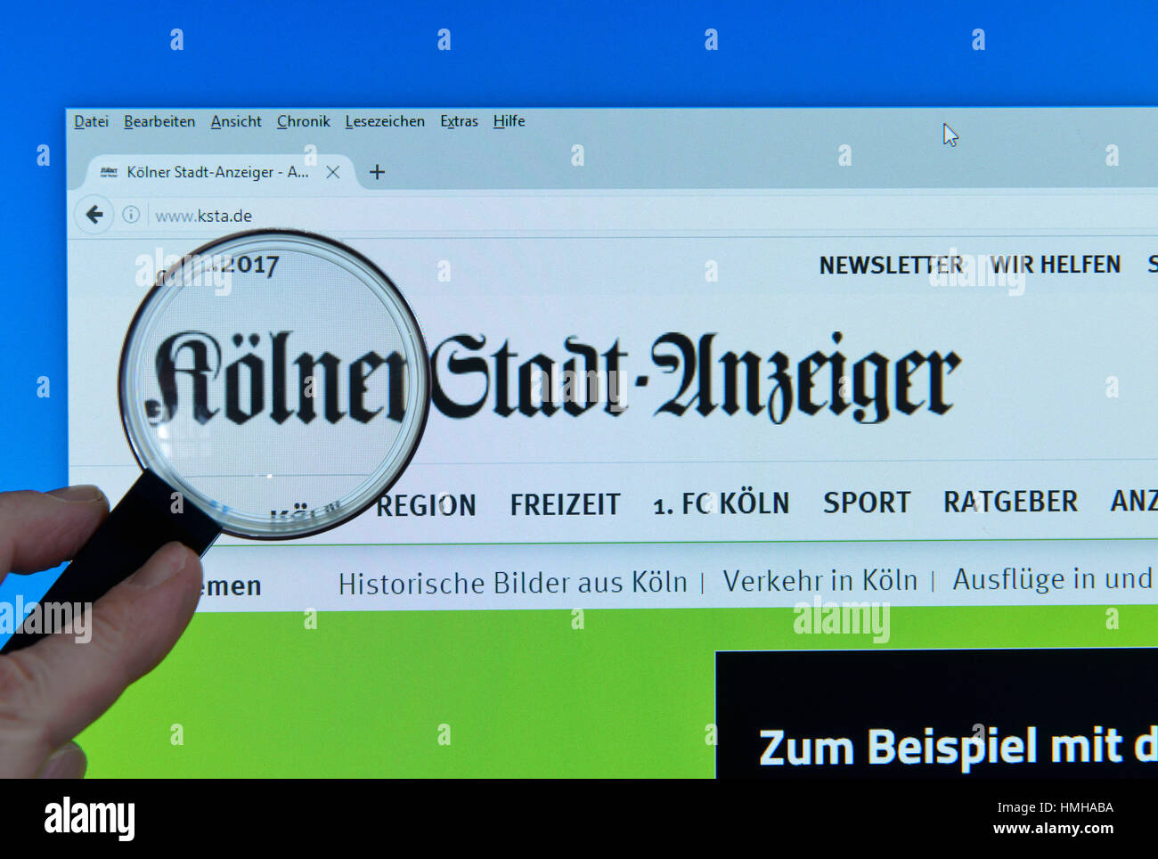 Cologne home-town newspaper, Internet, monitor, hand, magnifying glass, Koelner Stadtanzeiger, Monitor, Hand, Lupe Stock Photo