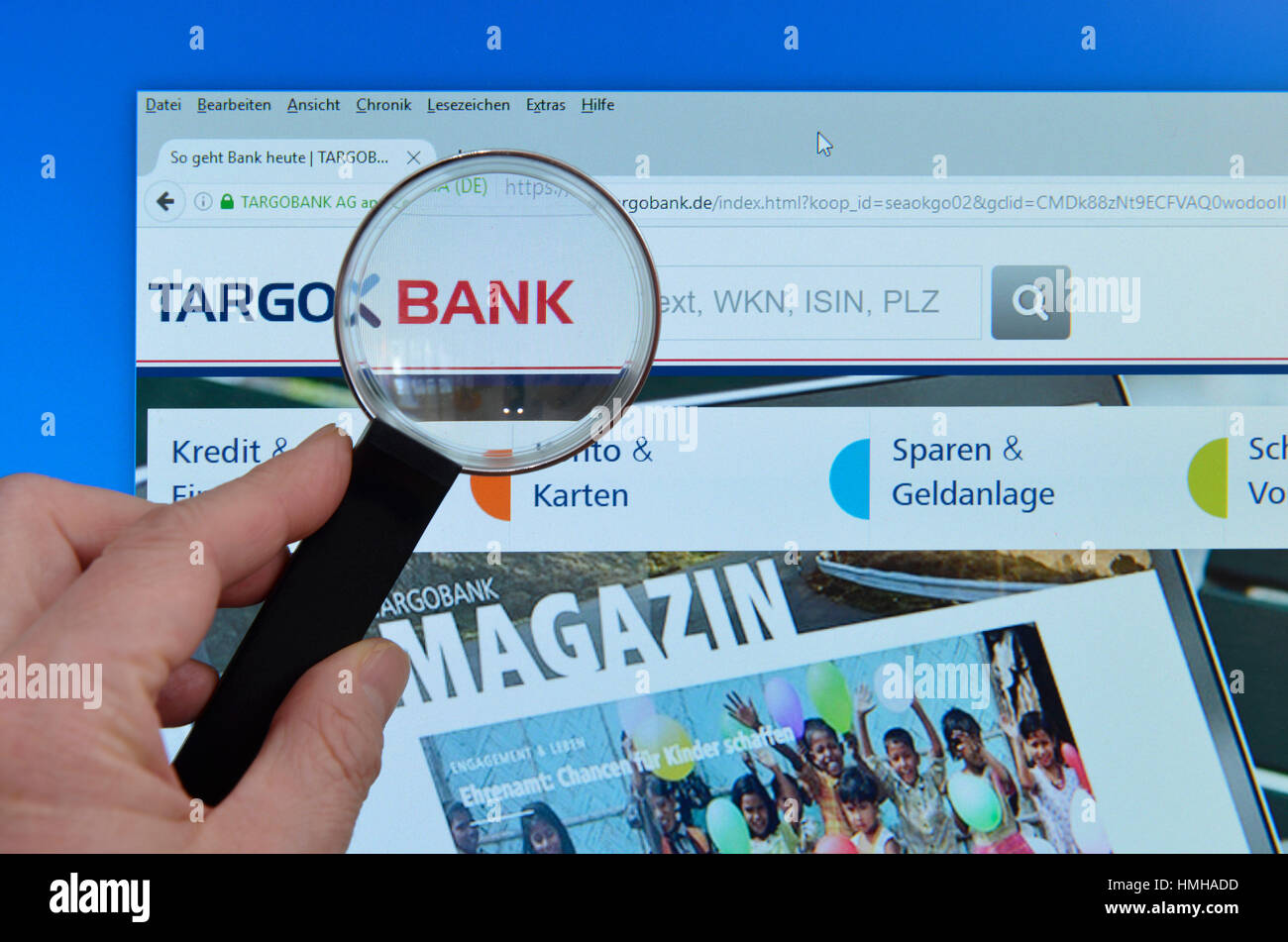 Targobank, website, Internet, screen, magnifying glass, hand, Website, Bildschirm, Lupe, Hand Stock Photo