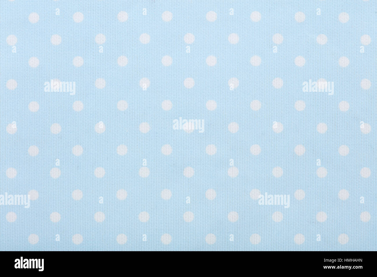 Pastel blue polka dot fabric macro, texture background Stock Photo