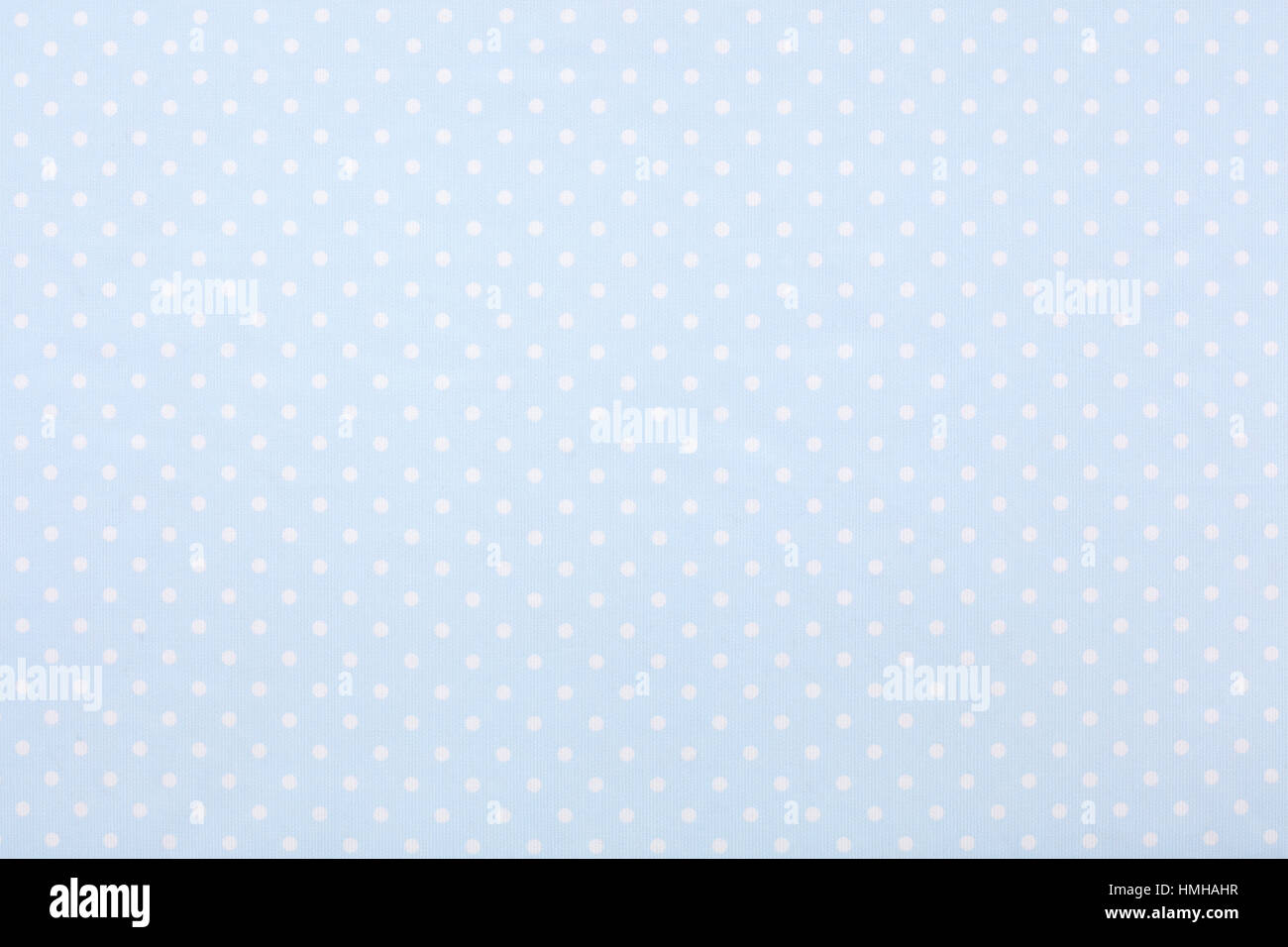 Blue polka dot fabric texture background Stock Photo