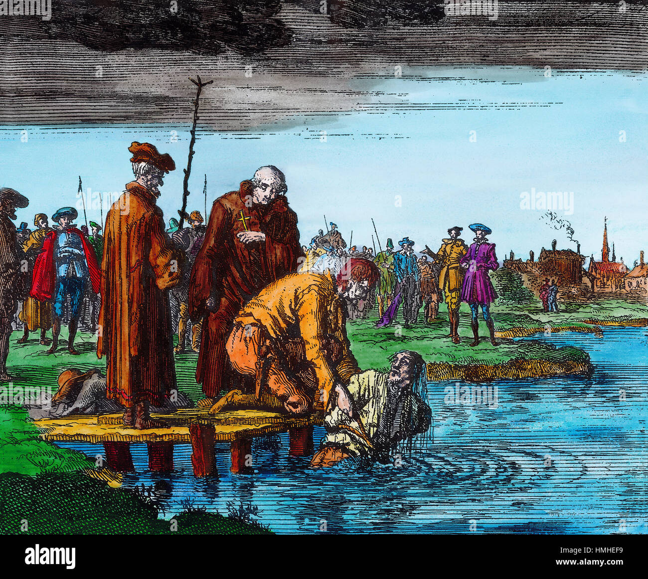 Hand coloured line drawing of the Anabaptist Matthias Mayr being repeatedly pushed under the water until he drowned at Wier, Holland in 1592. Stock Photo