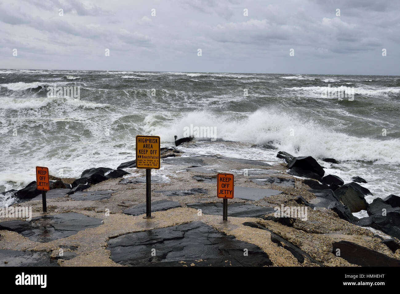 Ocean crashing on the jetty in North Wildwood, NJ during a storm Stock