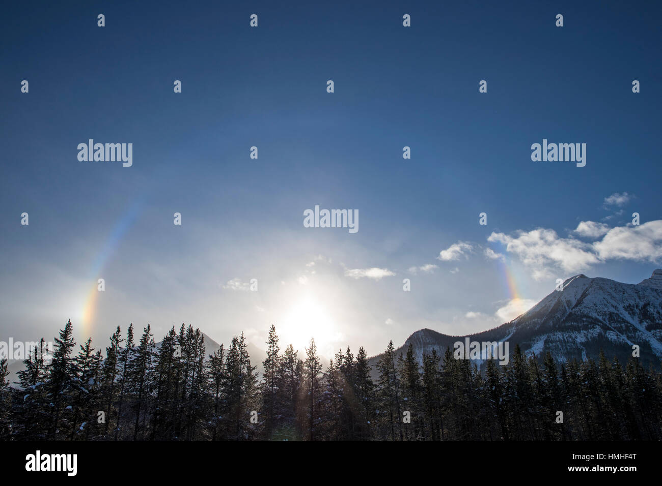 Sundog - rainbows over Canadian Rocky Mountains; British Columbia; Canada Stock Photo