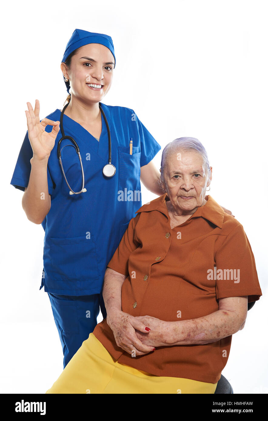 Old Patient with happy nurse isolated  white Stock Photo