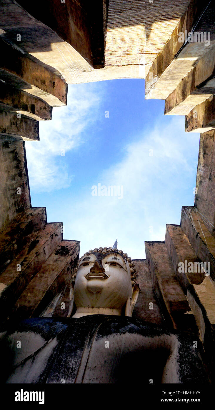 Historical Park Wat Sri chum temple bhudda statue up in Sukhothai world heritage Stock Photo