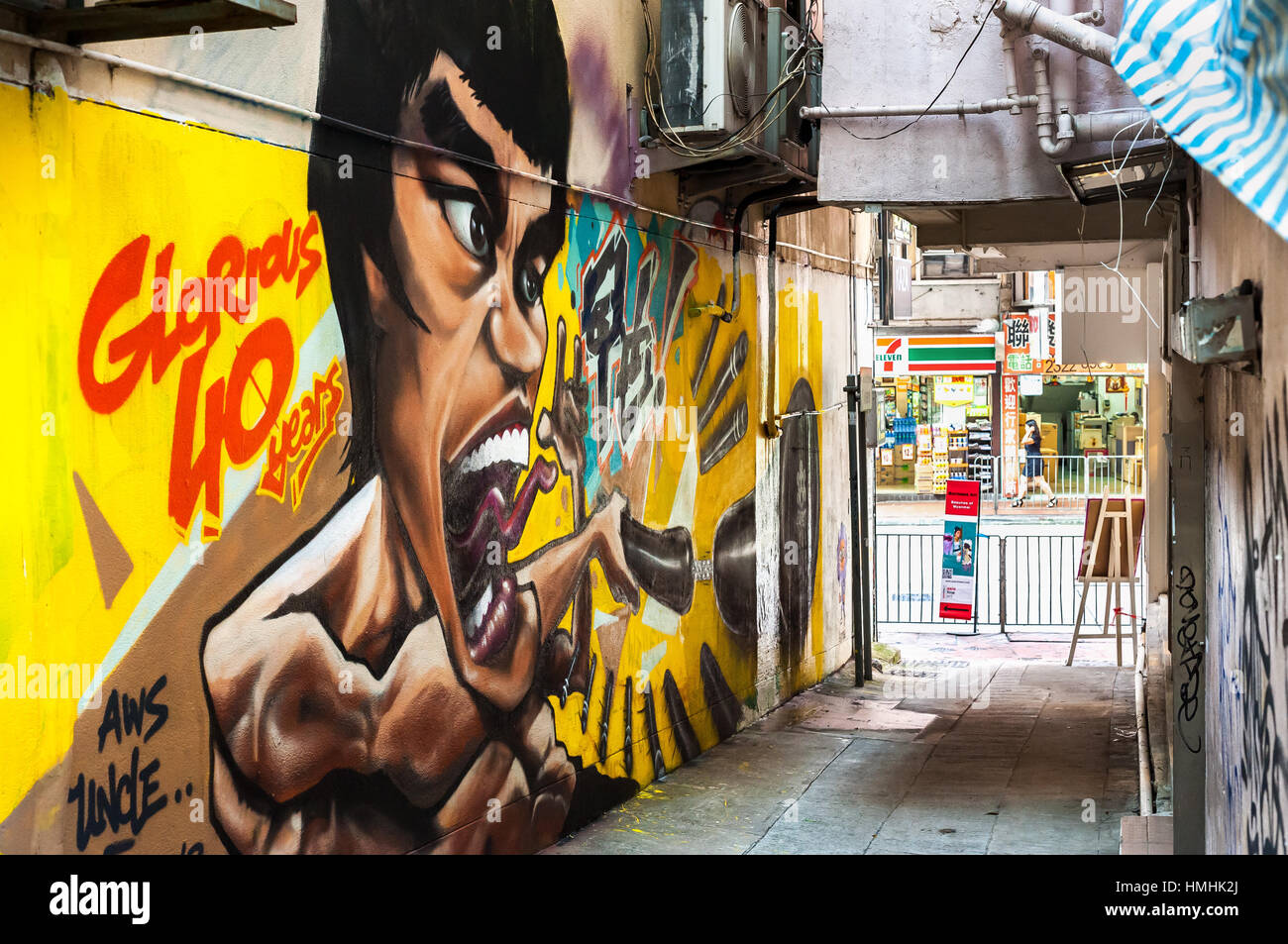 Graffitied mural of Hong Kong martial arts legend Bruce Lee in Wan Chai