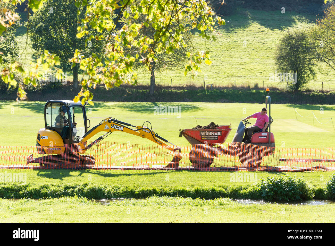 Green excavator hires stock photography and images Alamy