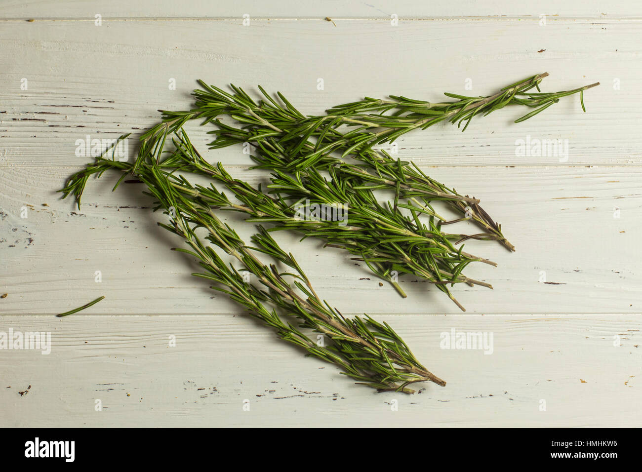 Bunch of Rosemary on White Wooden background Stock Photo - Alamy