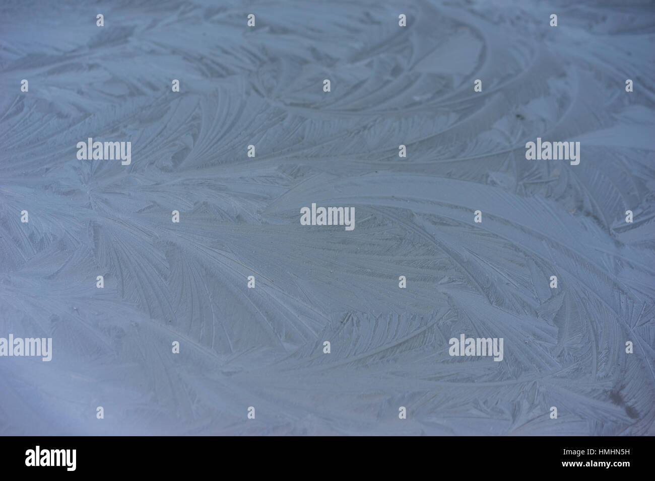 Ice patterns on a car windscreen Stock Photo