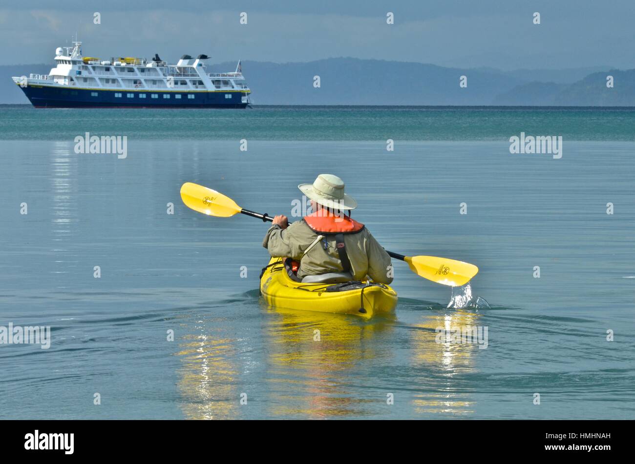 Man kayaking the shallow waters of the Rio Tigris in Costa Rica. Stock Photo